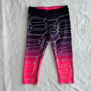 Fabletics Reflective Mid Rise Capri Pink & Purple Yoga Pants Size Medium